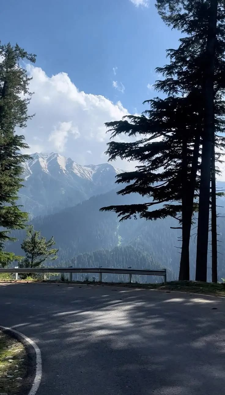 Wide view of mountain peaks at golden hour